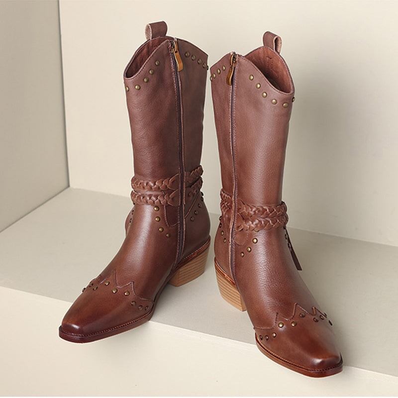 Vintage leren westernlaarzen voor dames met klinknagels en kwastjes in zwart/abrikoos/bruin.