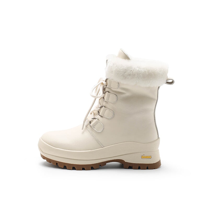 Dames leren chunky laarzen met schapenvachtvoering in abrikoos/beige