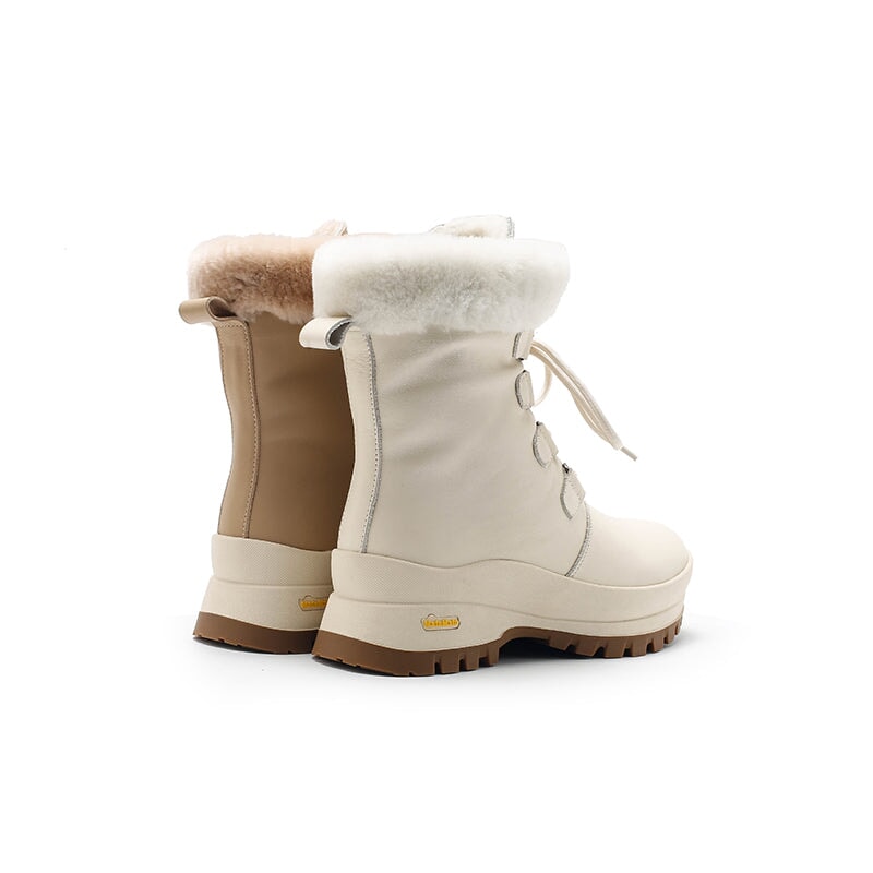 Dames leren chunky laarzen met schapenvachtvoering in abrikoos/beige