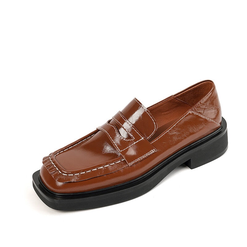 Penny loafers van lakleer voor dames in koffiebruin/zwart.