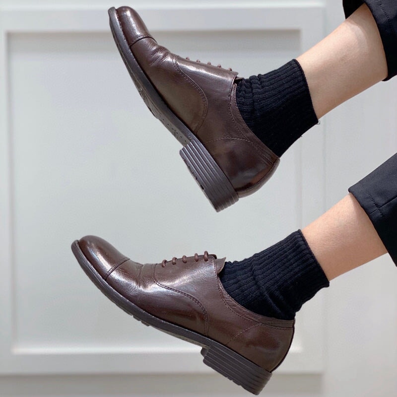 Goodyear klassieke oxfordschoenen van kalfsleer voor dames met rubberen zool in bruin/koffiekleur.