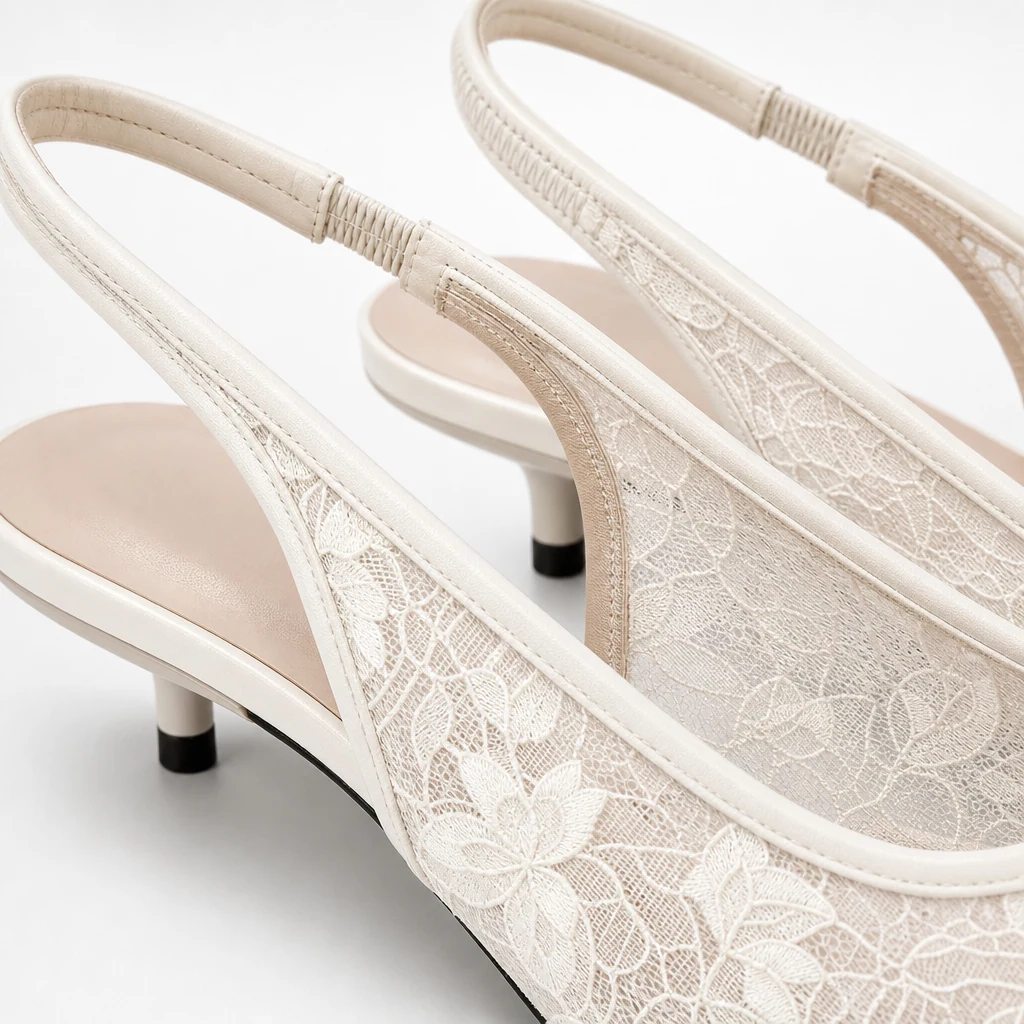 Close-up detail of embroidered mesh kitten heel material and finish