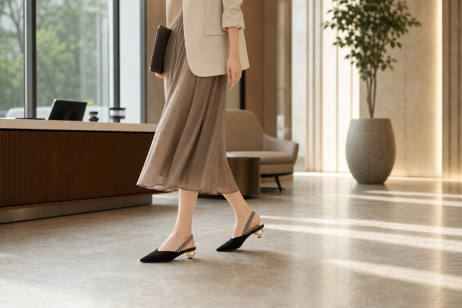 Lifestyle scene showing black slingback heels in context